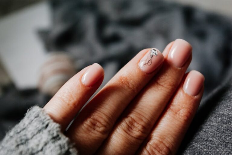 maniko nails - From above of crop unrecognizable female in warm sweater demonstrating hands with man